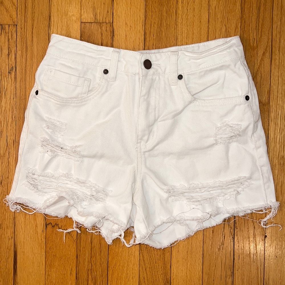 Distressed white shorts